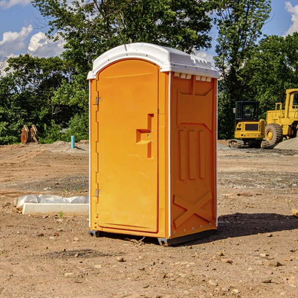 how often are the portable restrooms cleaned and serviced during a rental period in East St. Clair